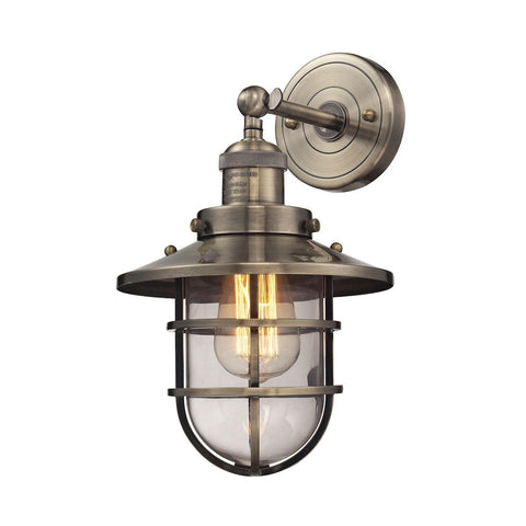 Seaport 1 Light Sconce In Antique Brass And Clear Glass Wall Sconce Elk Lighting 