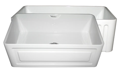 Farmhaus Fireclay Reversible Sink with a Raised Panel Front Apron on One Side and Fluted Front Apron on the Opposite Side